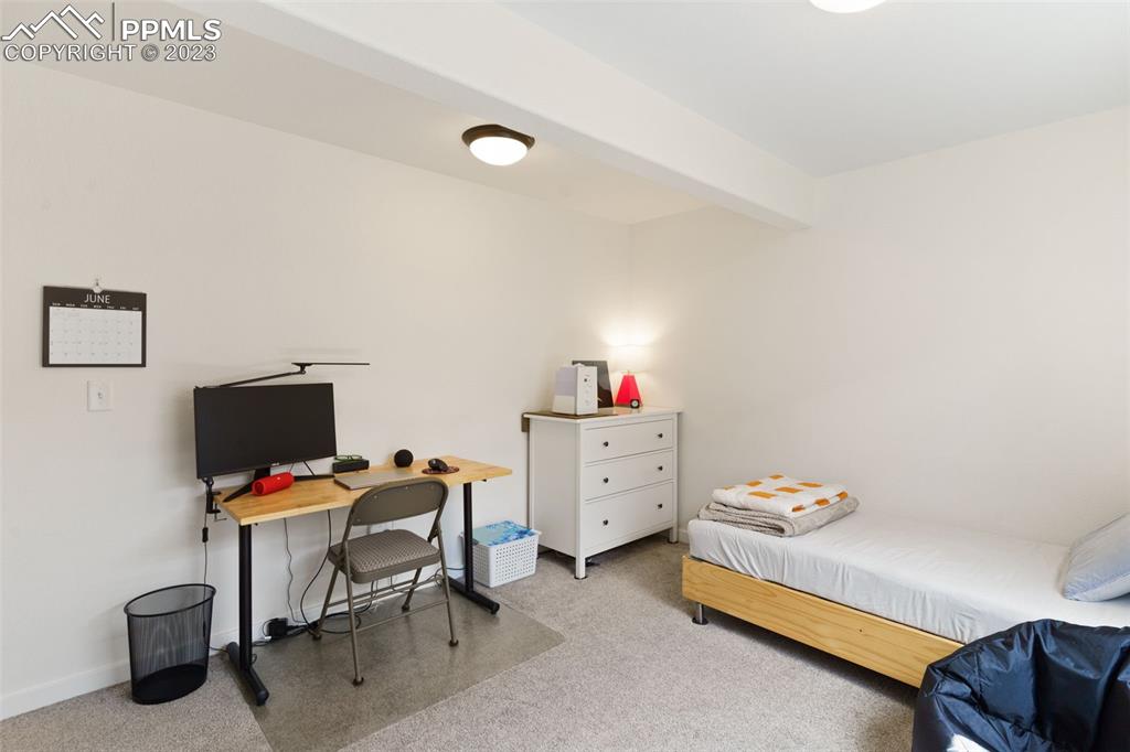 11969 Alydar Loop Colorado Springs, CO 80921 - Photo 23 of 39 a view of a workspace with furniture