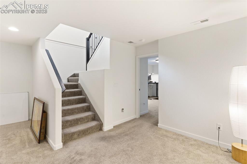 11969 Alydar Loop Colorado Springs, CO 80921 - Photo 33 of 39 a view of entryway with stairs