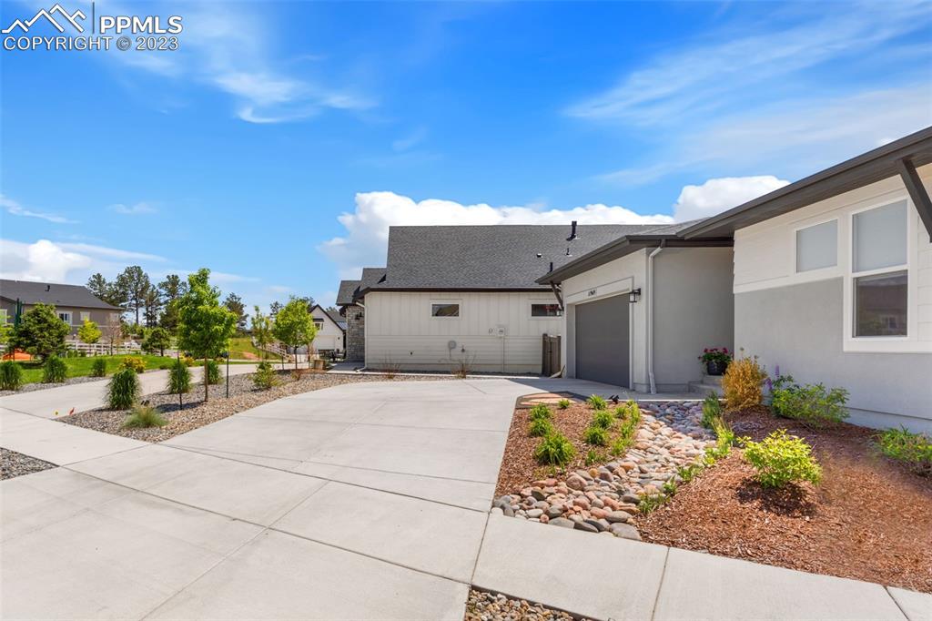 11969 Alydar Loop Colorado Springs, CO 80921 - Photo 4 of 39 a view of a back yard of the house
