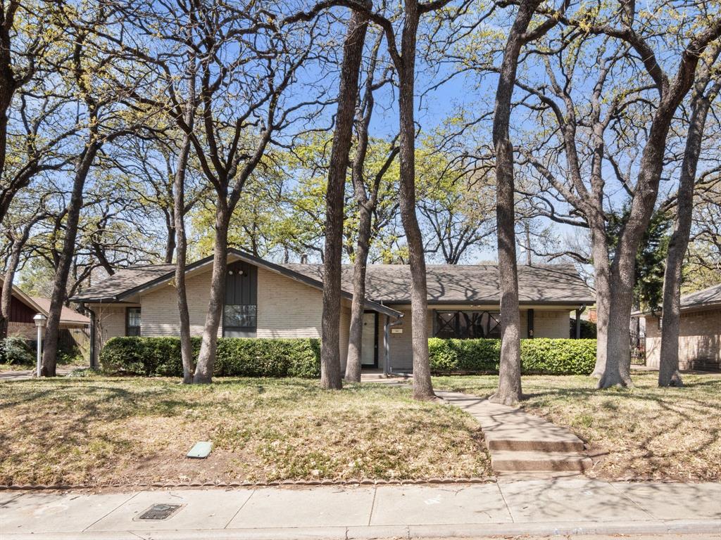 1805 Post Oak Drive Irving, TX 75061 - Photo 1 of 1 Mid-century home with brick siding