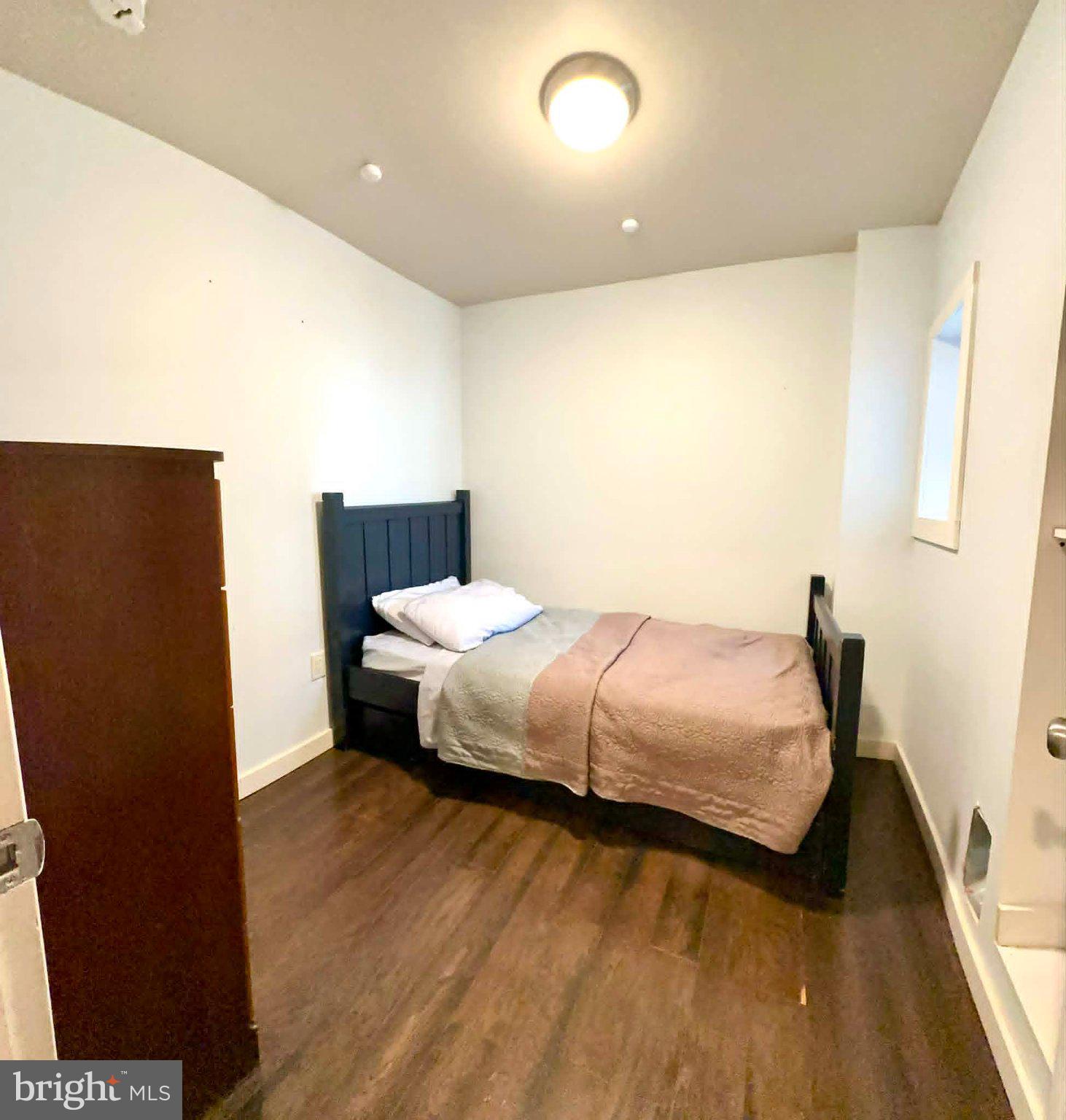 1209 Peters Street Philadelphia, PA 19147 - Photo 9 of 13 Cozy bedroom with modern simplicity.