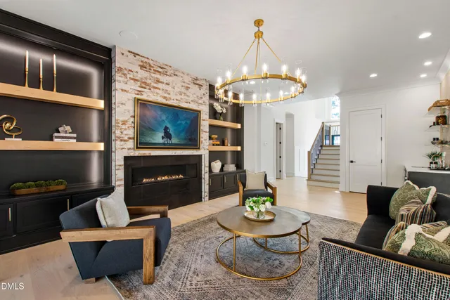 a kitchen with stainless steel appliances a stove a sink and a refrigerator