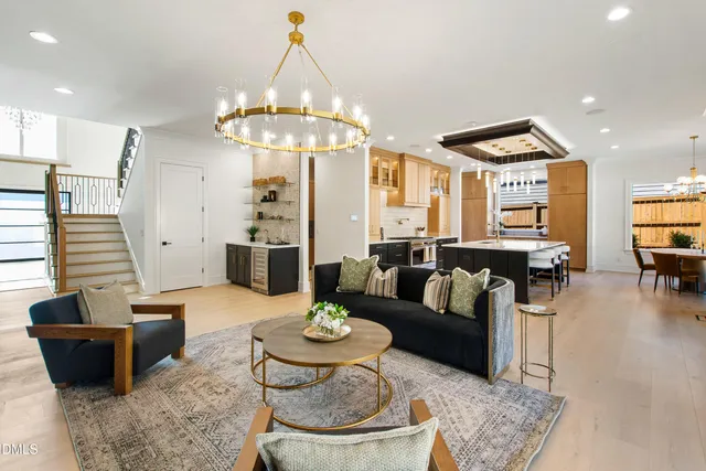 a view of a workspace with furniture and window