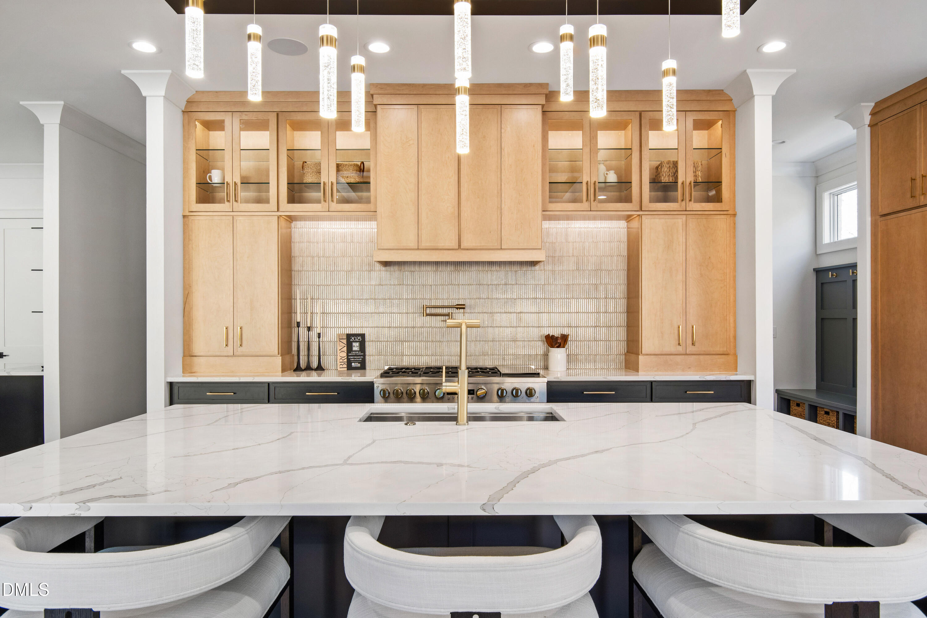405 Latimer Road Raleigh, NC 27609 - Photo 18 of 100 a kitchen with a table chairs sink and cabinets