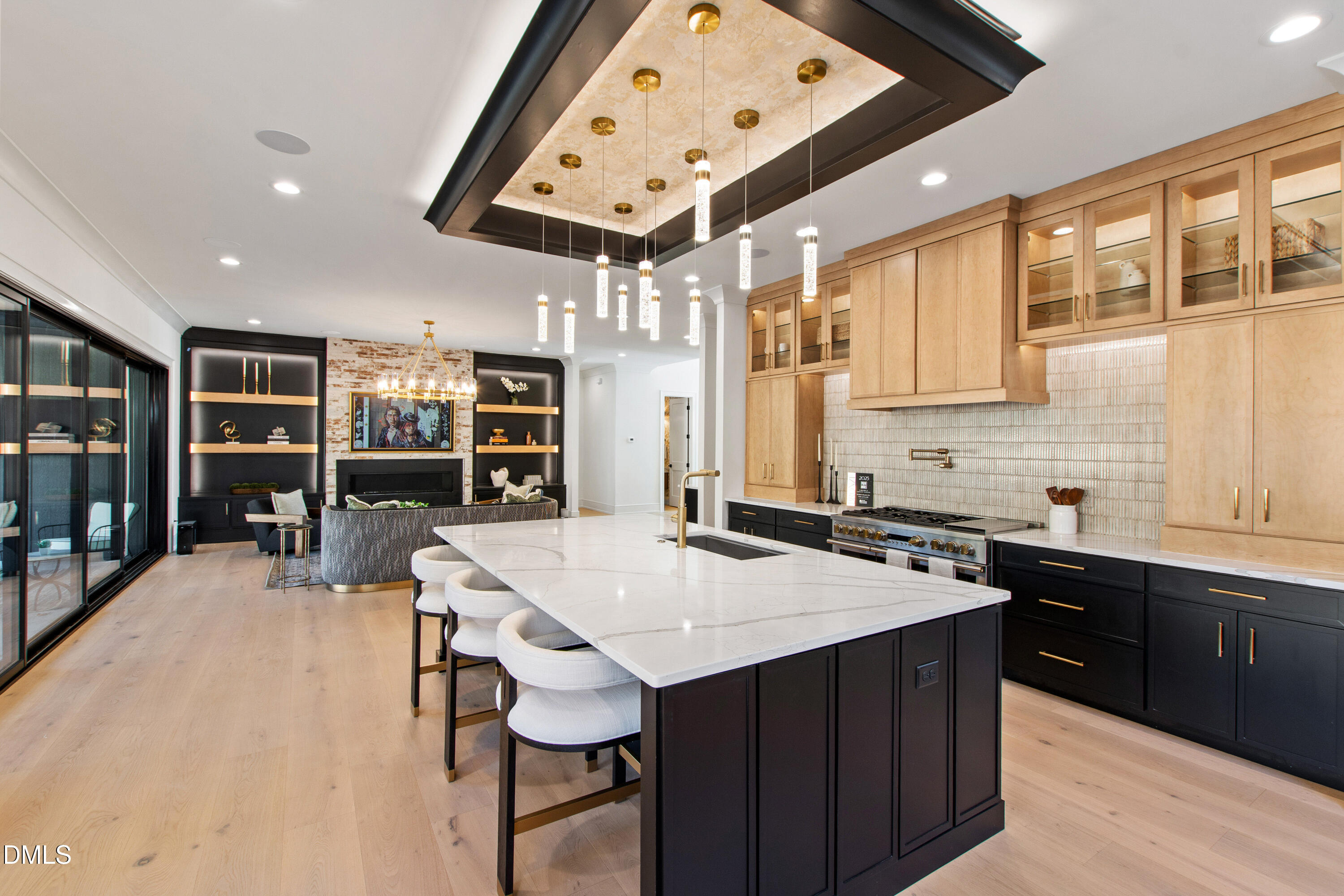 405 Latimer Road Raleigh, NC 27609 - Photo 19 of 100 a kitchen with stainless steel appliances a stove a sink dishwasher and a refrigerator with wooden floor