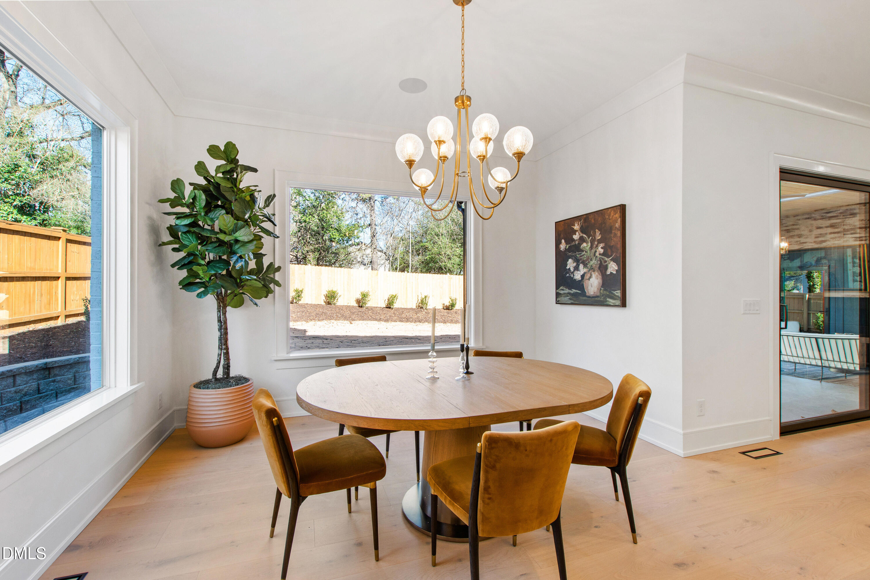 405 Latimer Road Raleigh, NC 27609 - Photo 26 of 100 a view of a dining room with furniture window and wooden floor