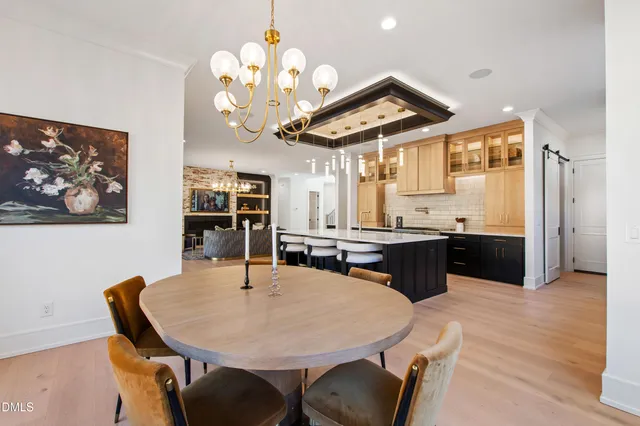 a kitchen with stainless steel appliances a sink and a cabinets