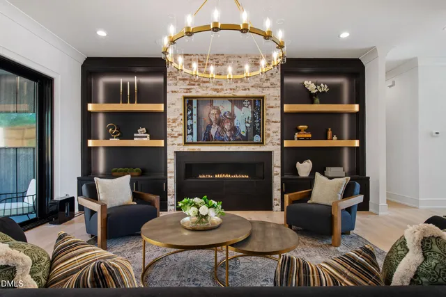 a dining hall with stainless steel appliances kitchen island granite countertop a dining table and chairs with the floor to ceiling window