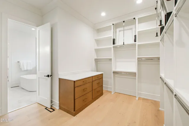 a view of room with window and ceiling fan