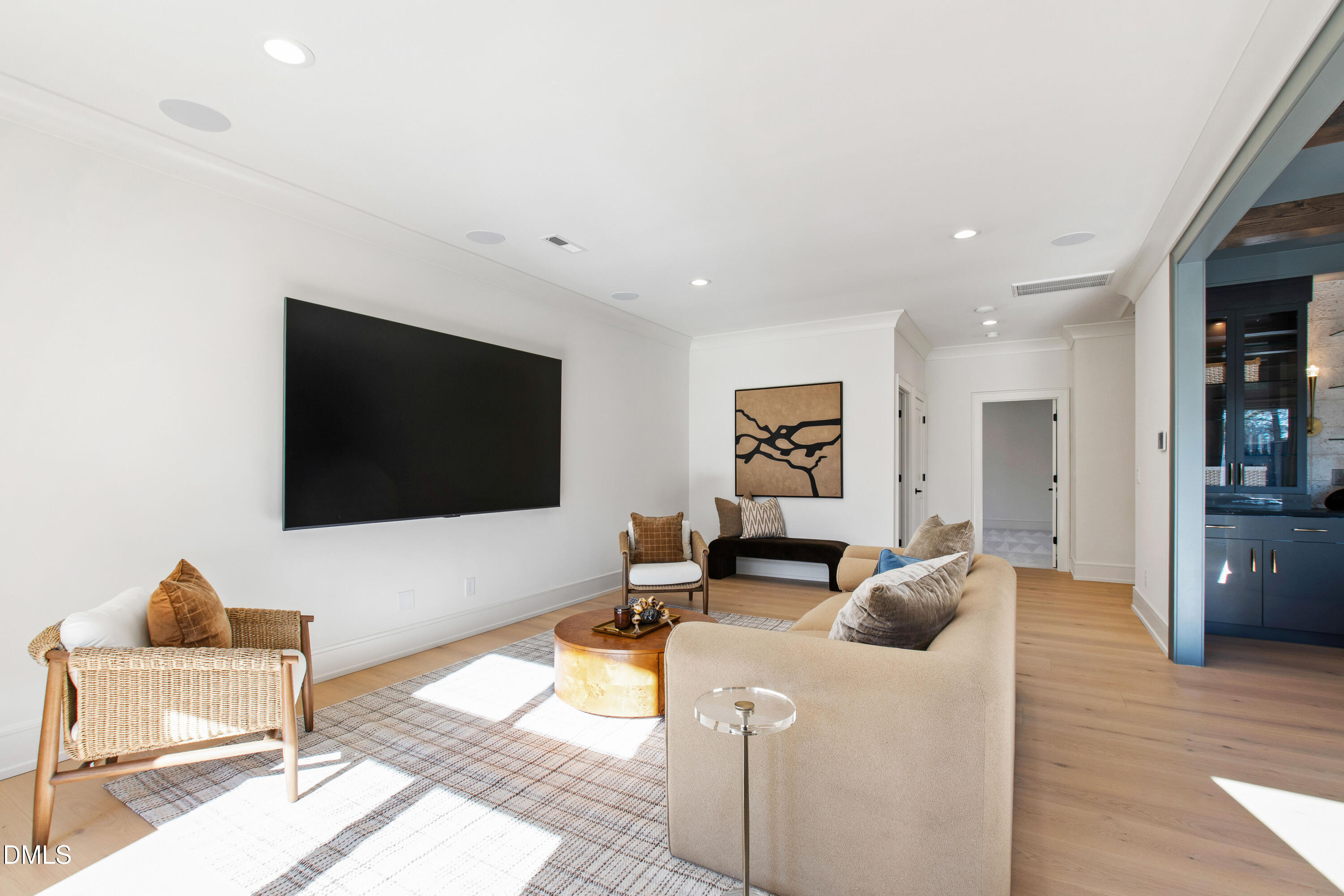 405 Latimer Road Raleigh, NC 27609 - Photo 48 of 100 a living room with furniture and a flat screen tv