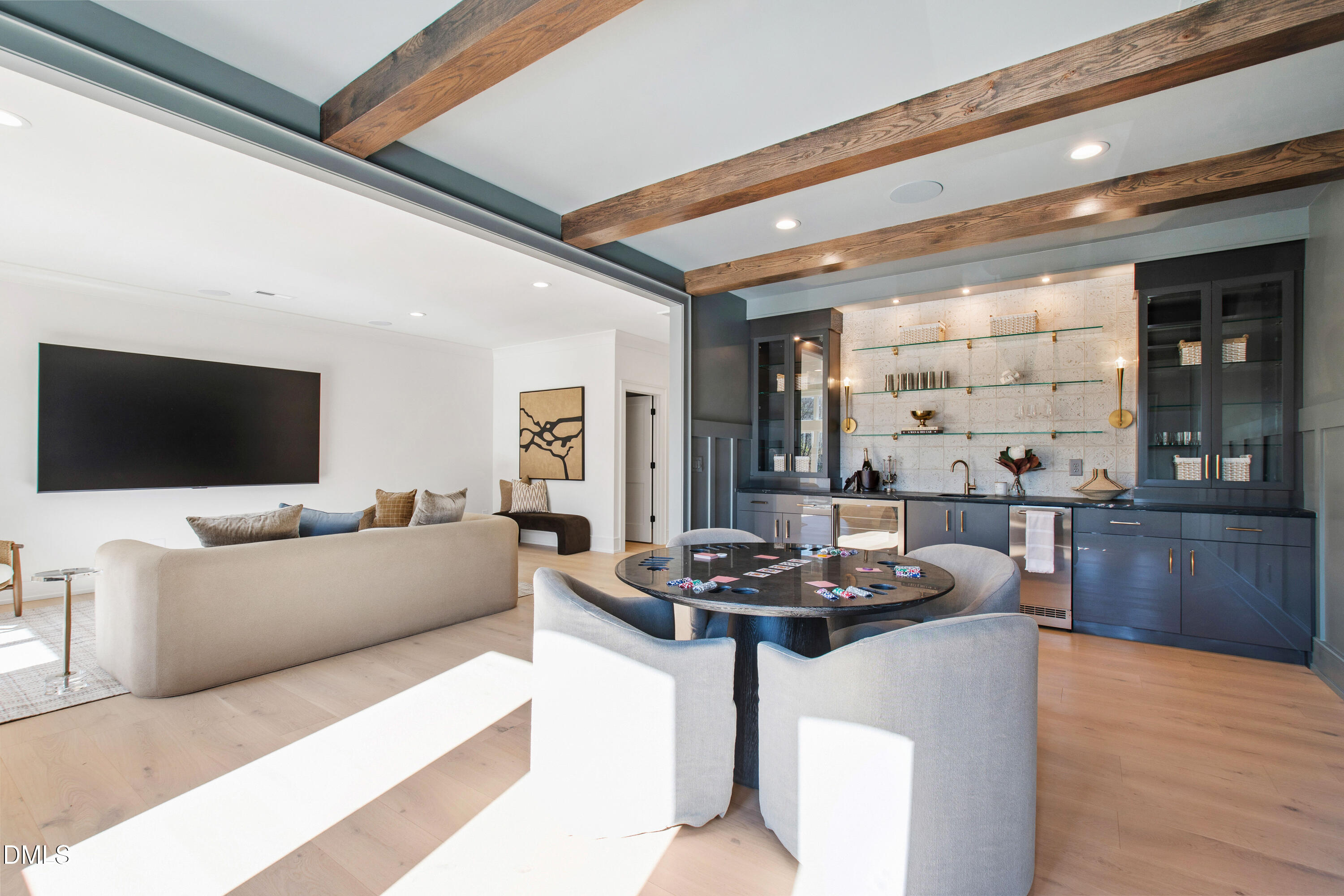 405 Latimer Road Raleigh, NC 27609 - Photo 49 of 100 a living room with furniture and a flat screen tv