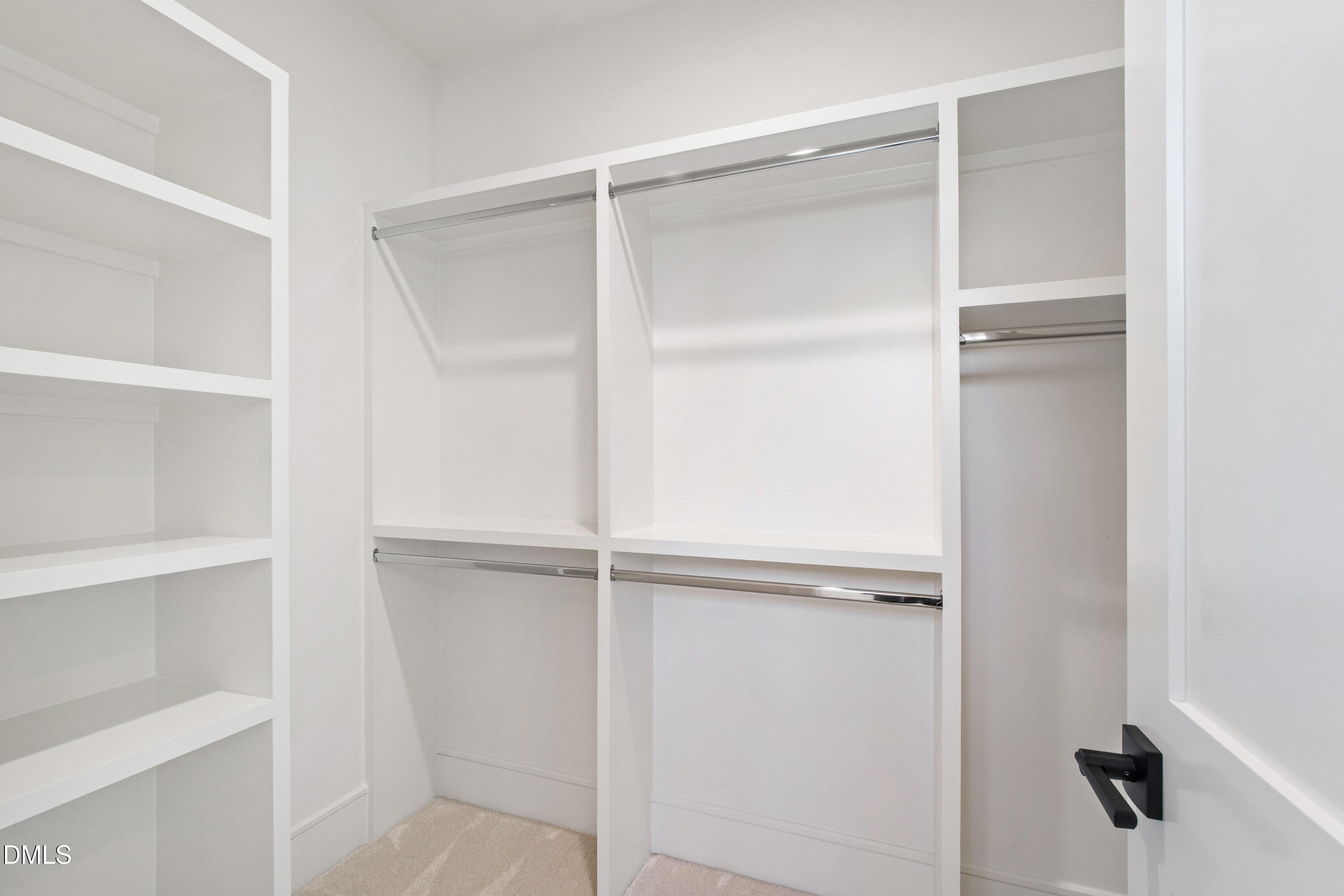 405 Latimer Road Raleigh, NC 27609 - Photo 56 of 100 a close view of closet with cabinet