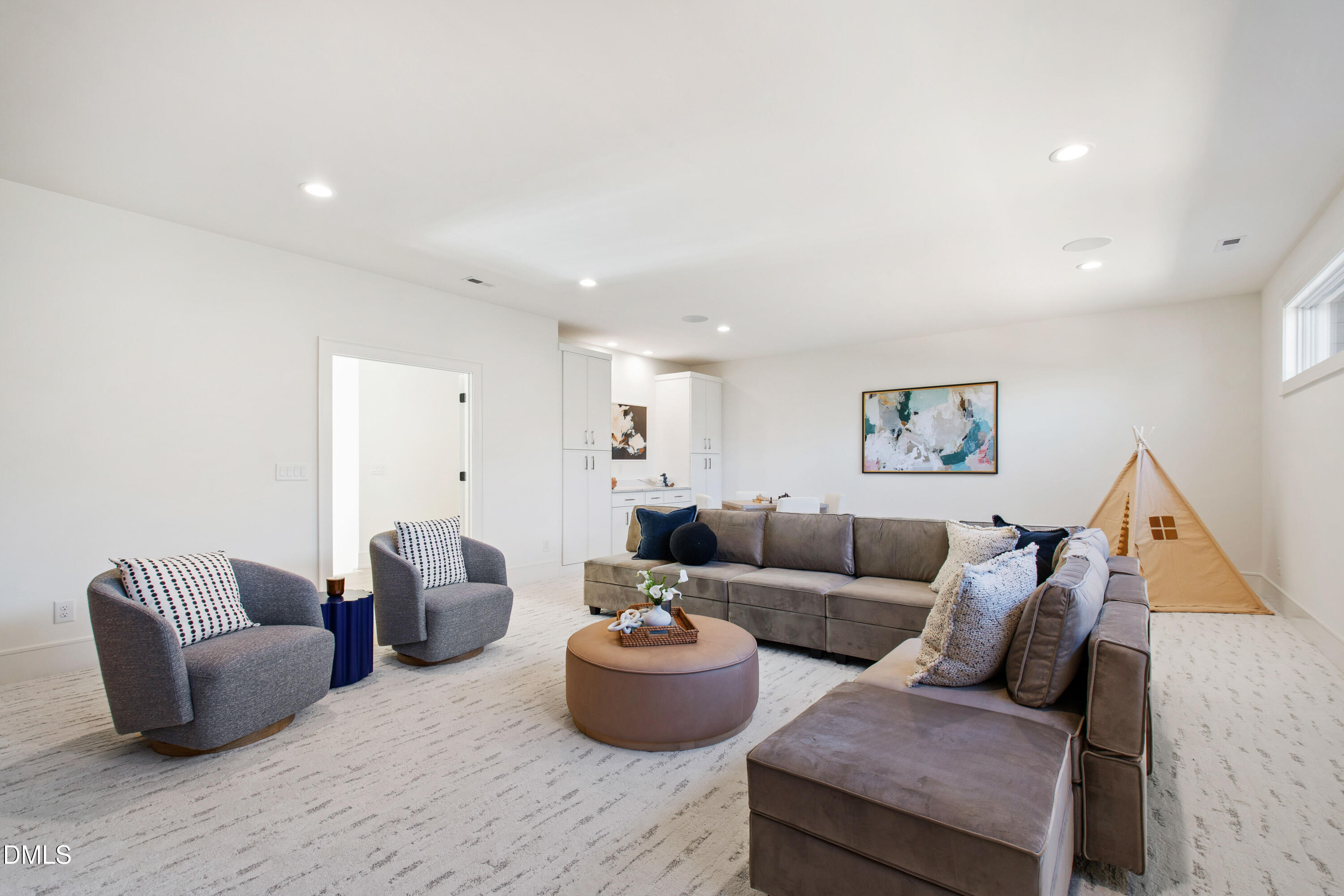 405 Latimer Road Raleigh, NC 27609 - Photo 59 of 100 a living room with furniture and a couch
