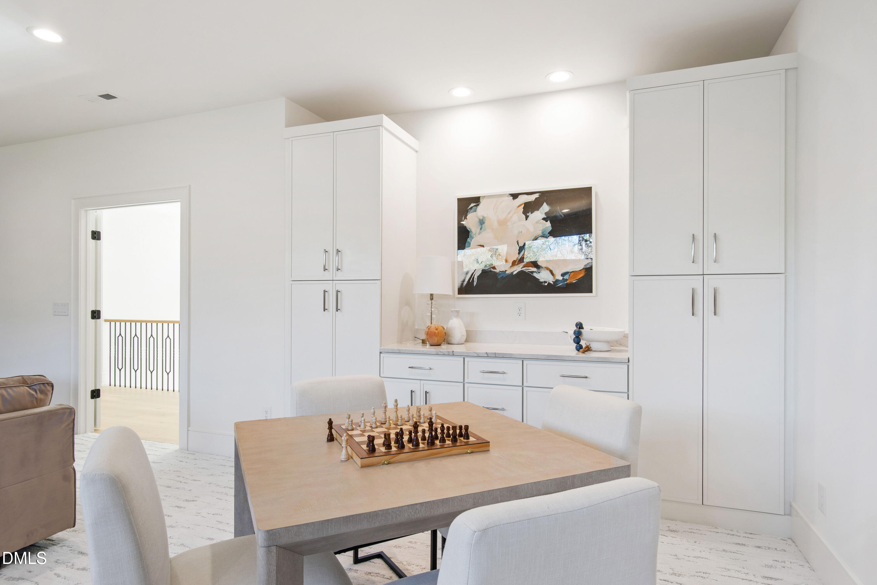 405 Latimer Road Raleigh, NC 27609 - Photo 61 of 100 a view of a dining room with furniture and wooden floor