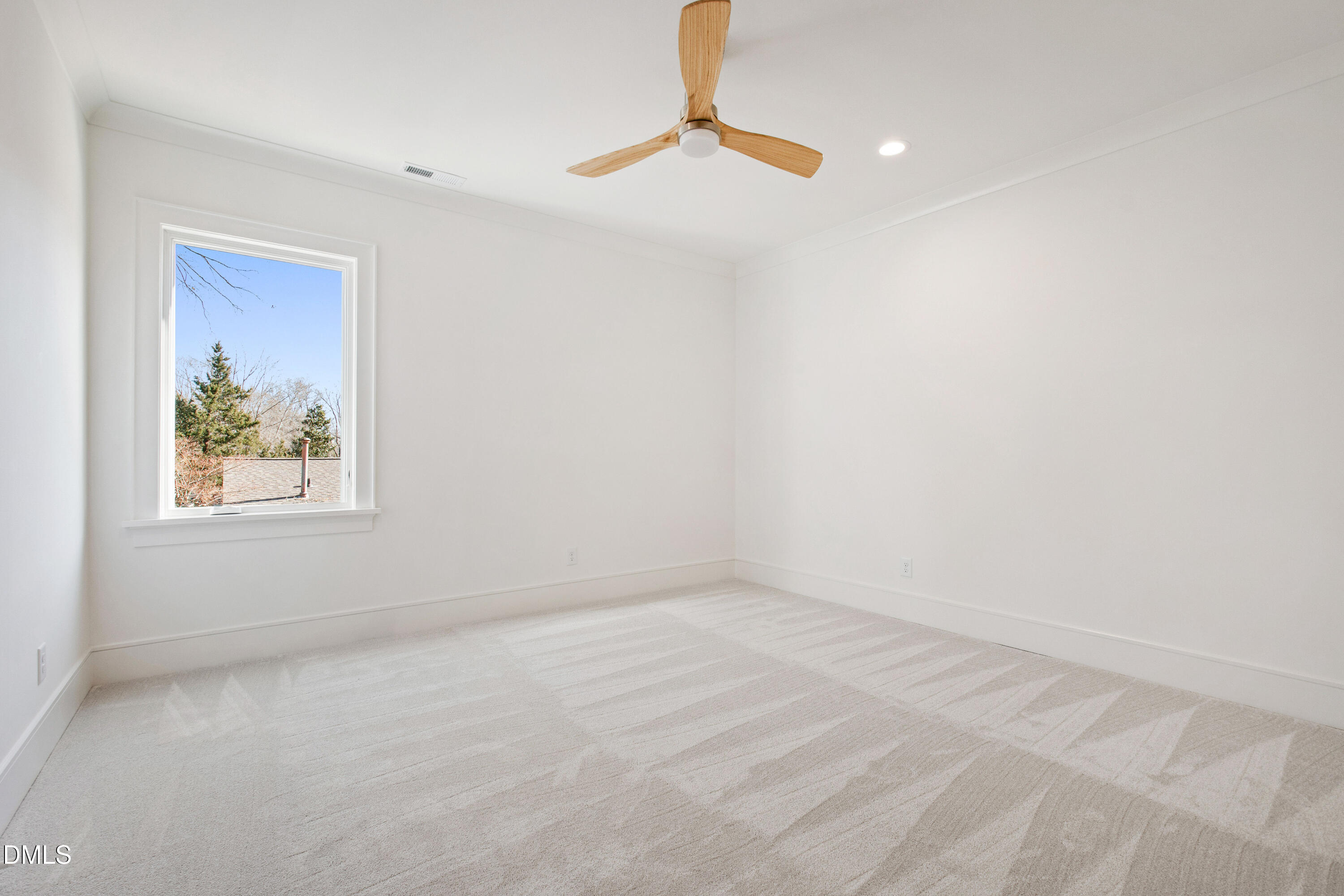 405 Latimer Road Raleigh, NC 27609 - Photo 67 of 100 a view of room with window and ceiling fan
