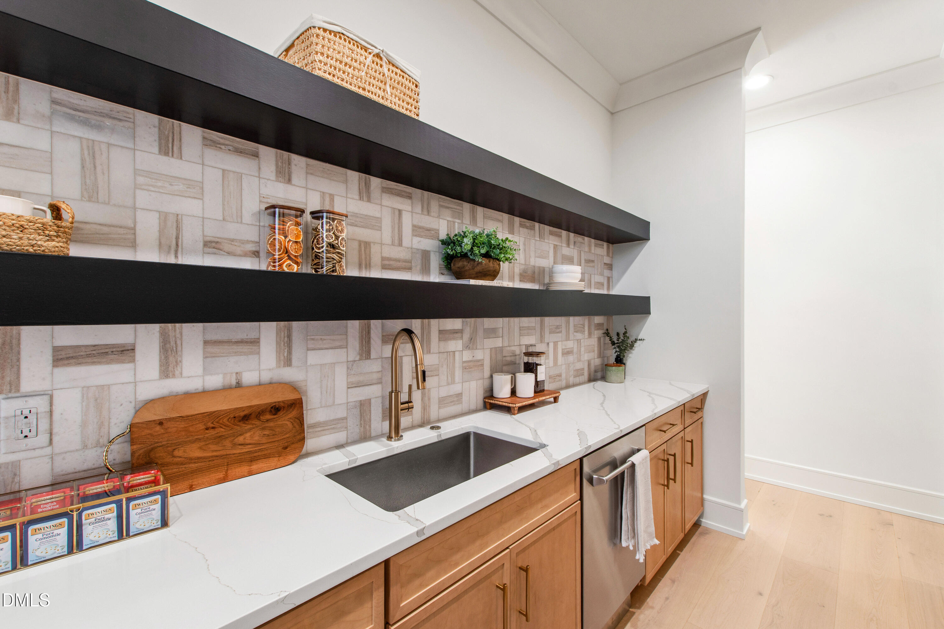 405 Latimer Road Raleigh, NC 27609 - Photo 78 of 100 a kitchen with stainless steel appliances granite countertop a sink and a stove