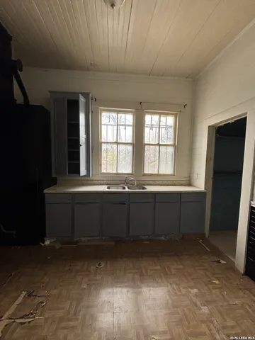 a room with window and furniture