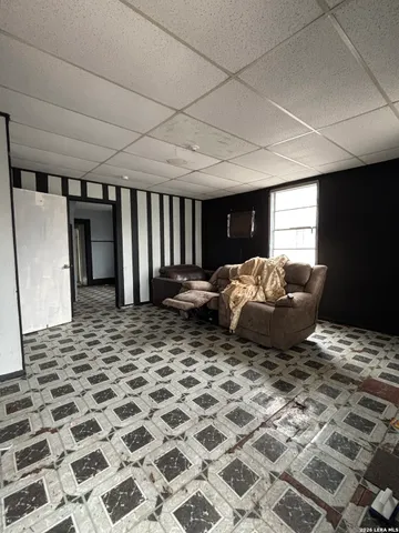 a bed room with a bed and a mirror