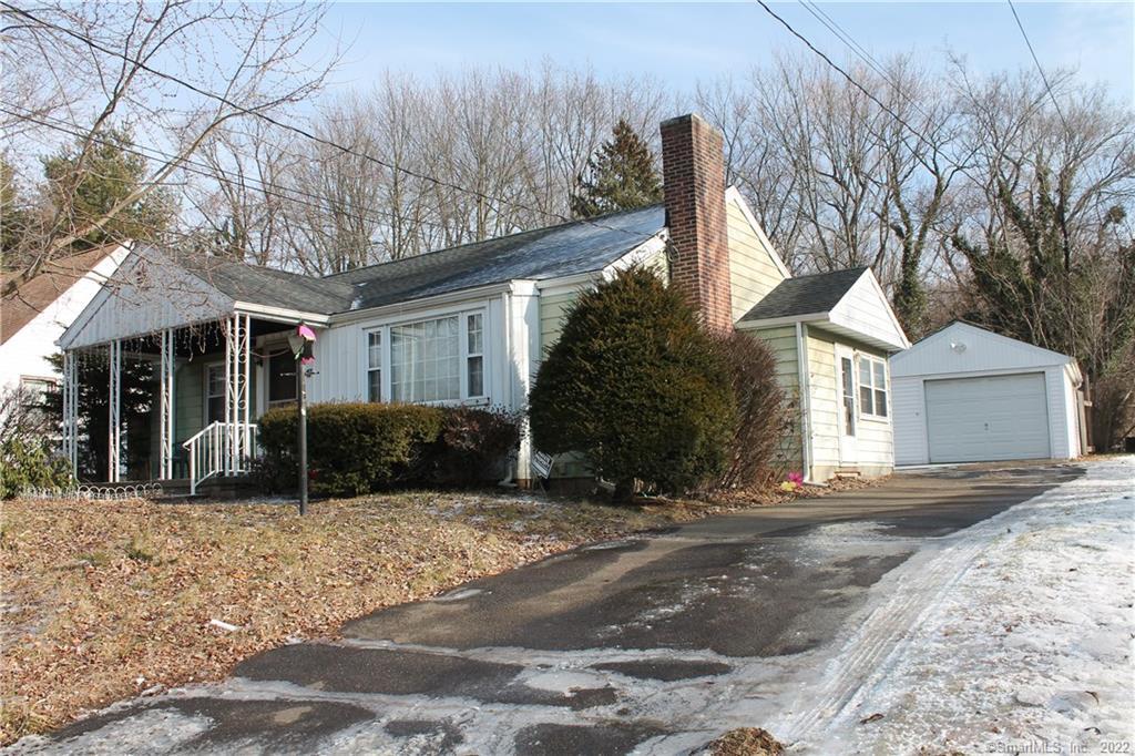 Front exterior and one car garage