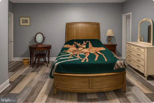 a bedroom with bed and window