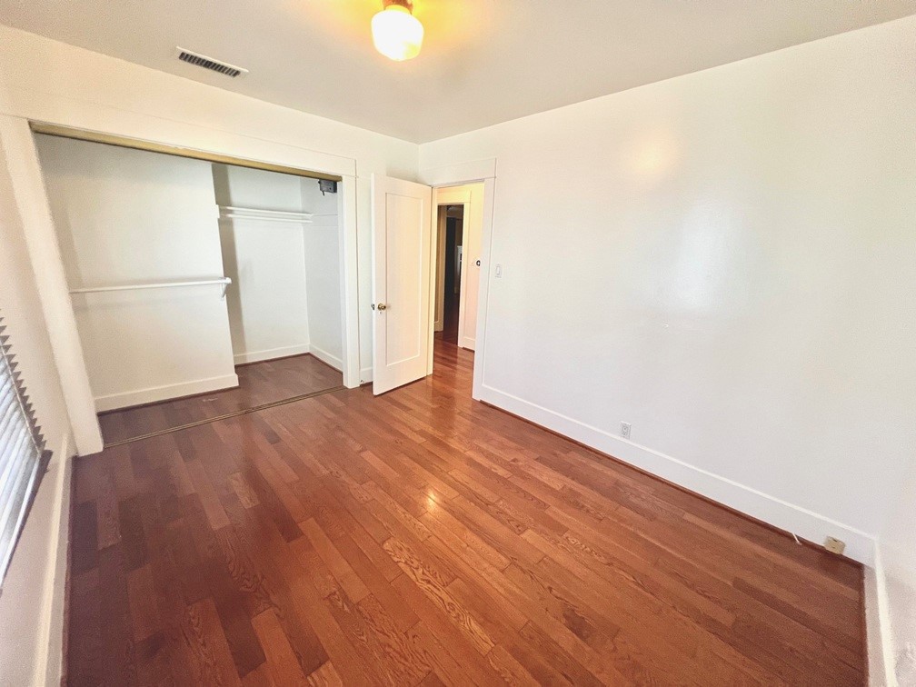 2909 Front Street Alhambra, CA 91803 - Photo 11 of 34 a view of an empty room with wooden floor