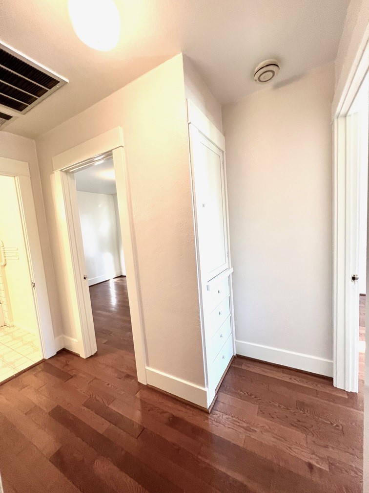 2909 Front Street Alhambra, CA 91803 - Photo 13 of 34 an empty room with wooden floor and window