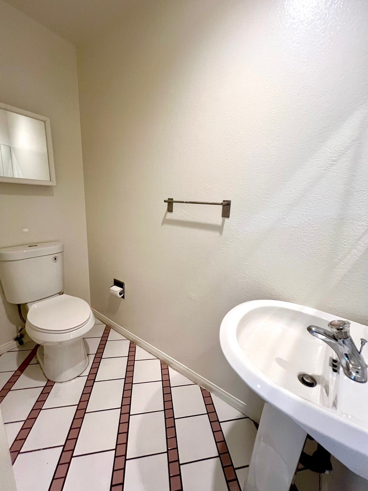 2909 Front Street Alhambra, CA 91803 - Photo 15 of 34 a bathroom with a sink and a toilet