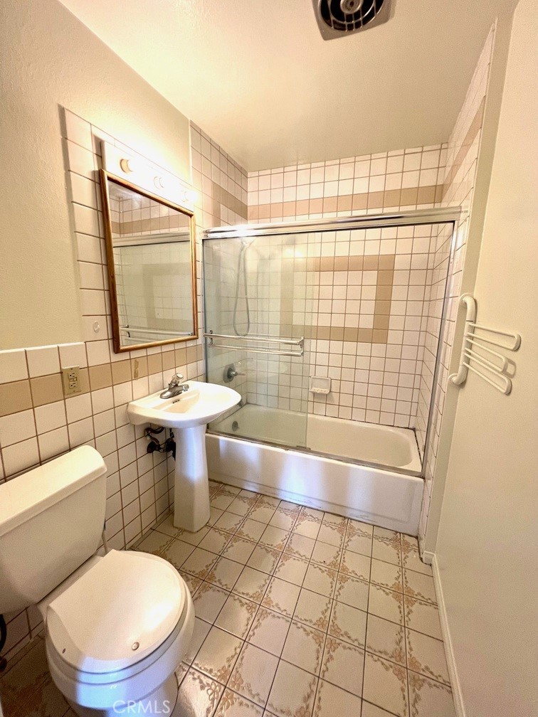 2909 Front Street Alhambra, CA 91803 - Photo 24 of 34 a bathroom with a sink toilet and shower