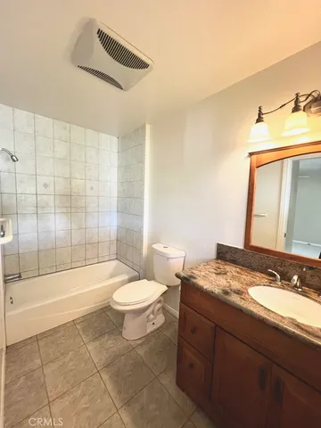 a view of a house with a large window