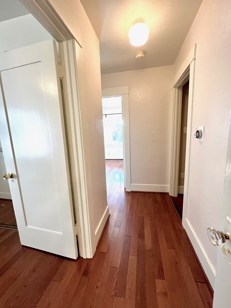 2909 Front Street Alhambra, CA 91803 - Photo 10 of 34 a view of a hallway with wooden floor