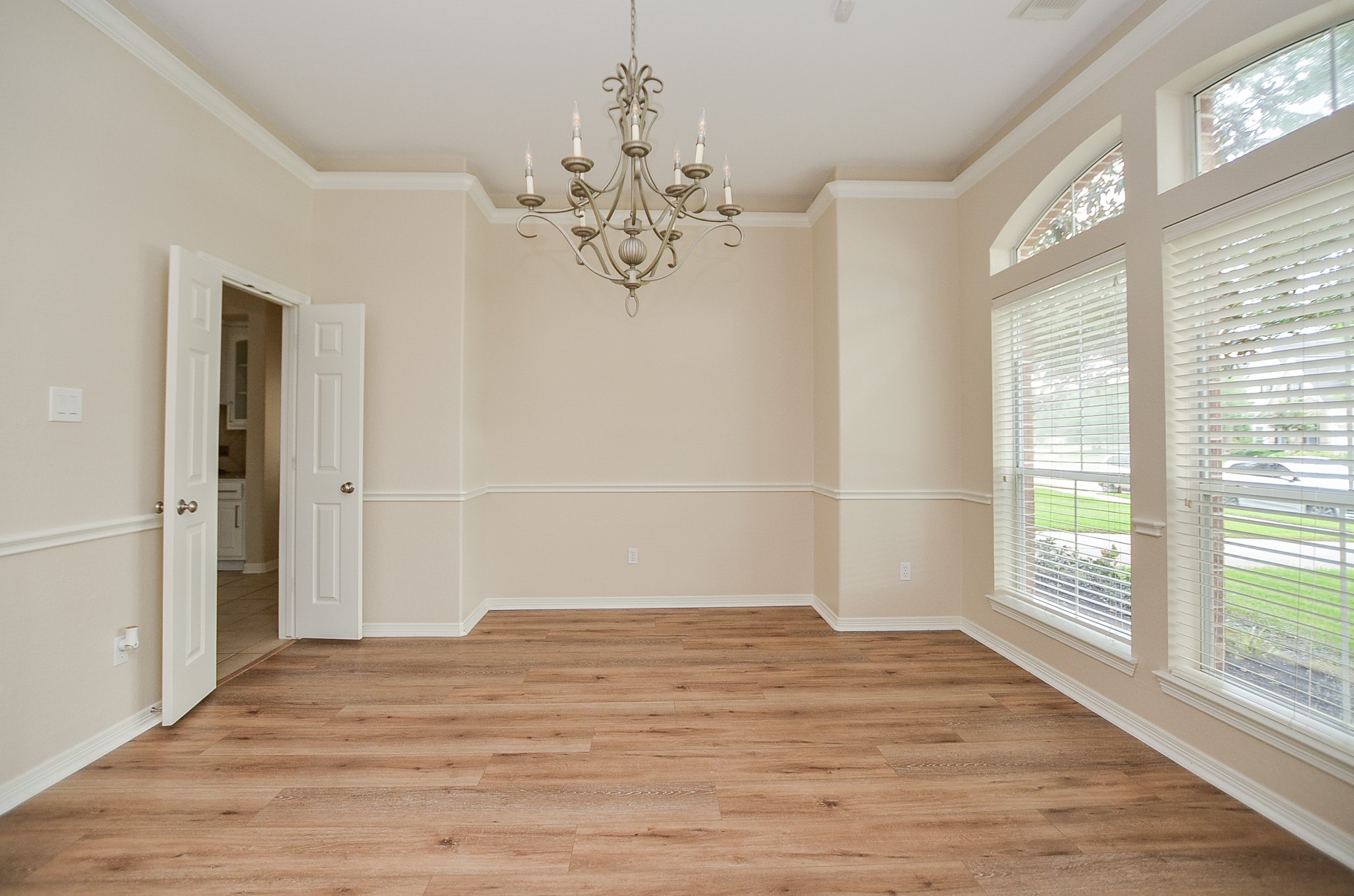 7218 Spring Run Lane Katy, TX 77494 - Photo 7 of 49 a view of empty room with wooden floor and fan