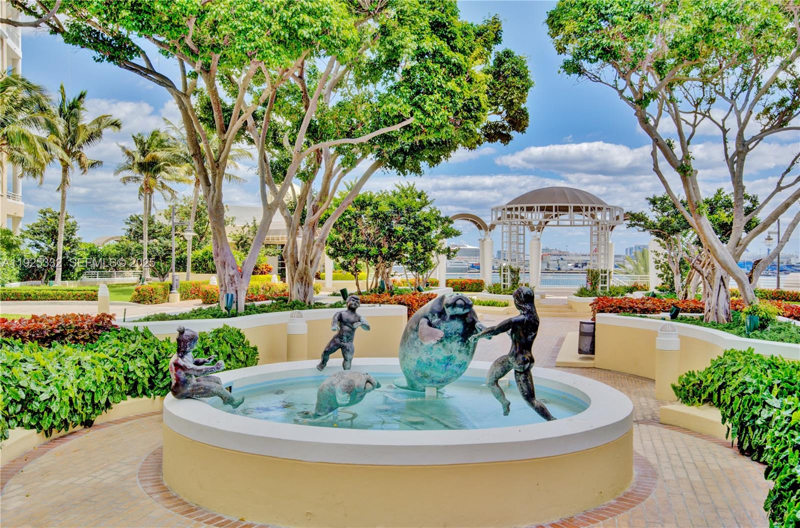 808 Brickell Key Drive, Unit 3304 Miami, FL 33131 - Photo 32 of 60 a view of a swimming pool with a patio