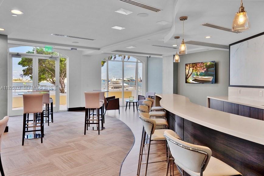 808 Brickell Key Drive, Unit 3304 Miami, FL 33131 - Photo 55 of 60 a view of a dining room with furniture window and outside view
