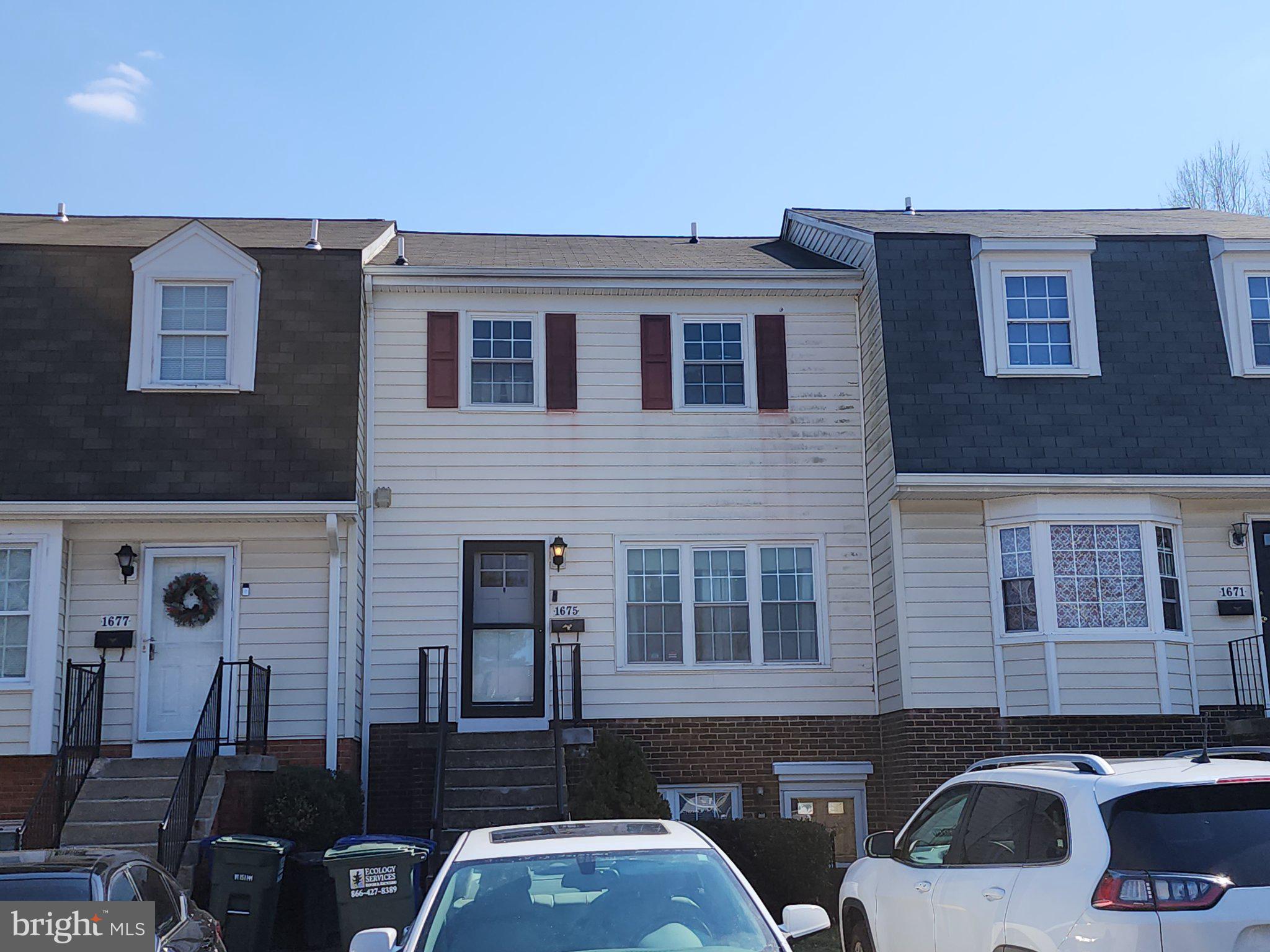 1675 Ridgely Court, Unit 182 Crofton, MD 21114 - Photo 8 of 47 a front view of a house with barbeque oven