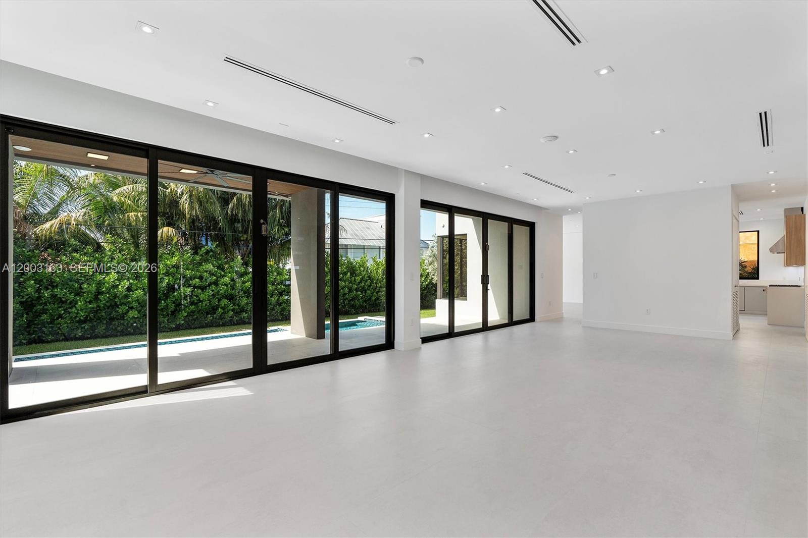 760 Woodcrest Road Key Biscayne, FL 33149 - Photo 7 of 43 a view of an ocean with a floor to ceiling window