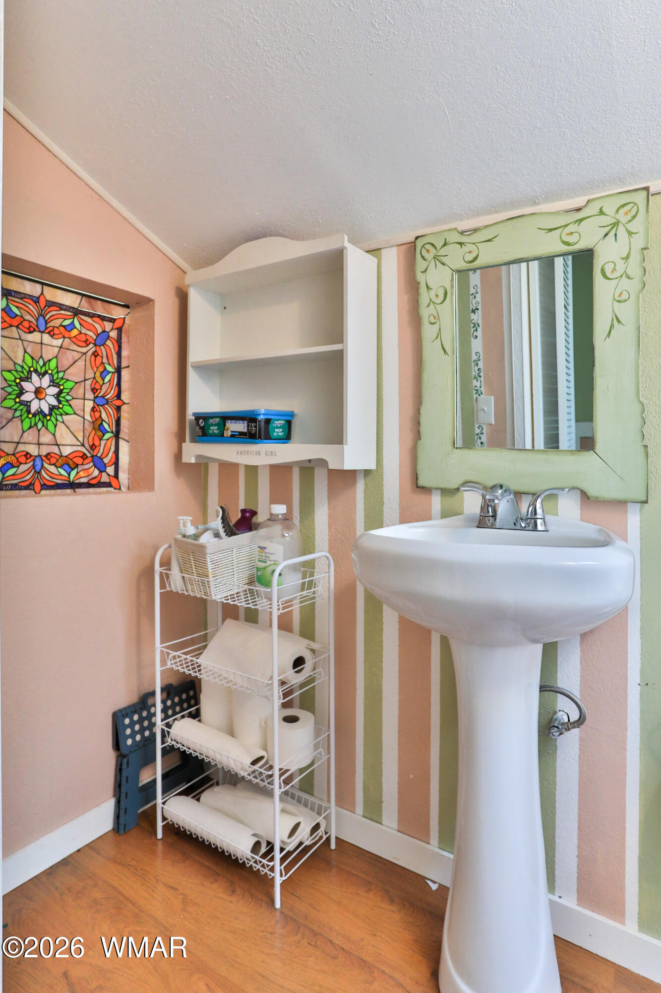 102 Crestview Road Holbrook, AZ 86025 - Photo 37 of 55 a bathroom with a sink and a mirror