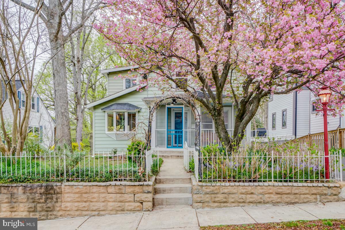 707 Silver Spring Avenue Silver Spring, MD 20910 - Photo 2 of 41 Ensconced in a lush setting,