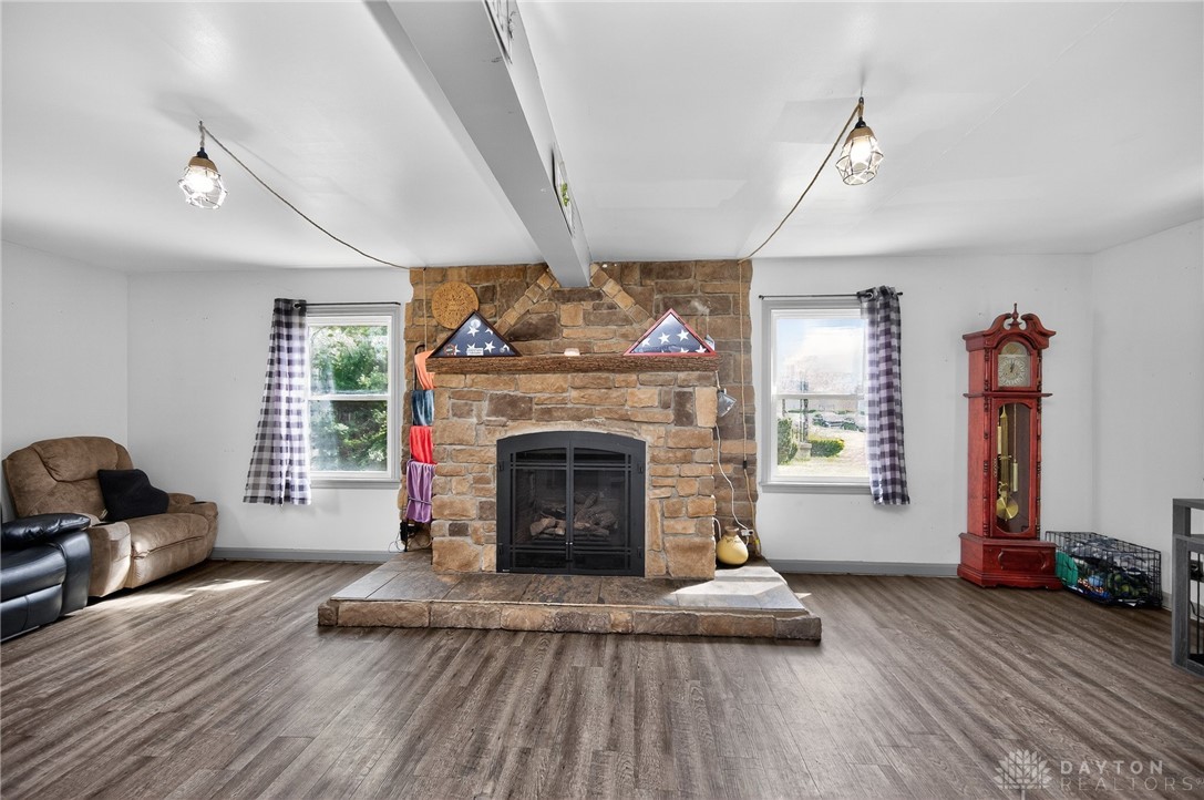 3301 Wildwood Road Middletown, OH 45042 - Photo 7 of 68 This inviting living space features a captivating stone fireplace, perfect for cozy???????????????????????? gatherings.