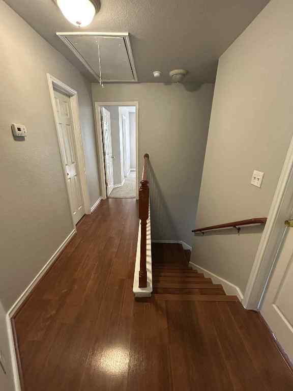 1512 Parkfield Circle Round Rock, TX 78664 - Photo 15 of 26 wooden floor with staircase