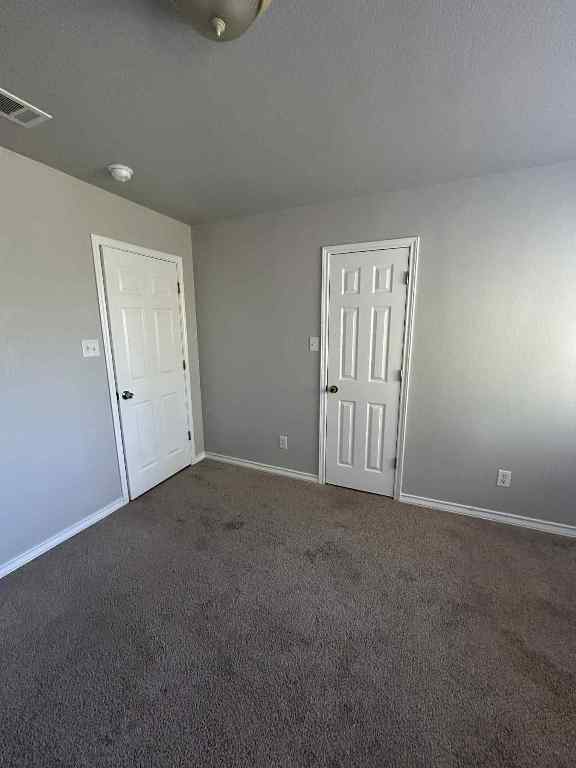1512 Parkfield Circle Round Rock, TX 78664 - Photo 18 of 26 a view of an empty room and closet area