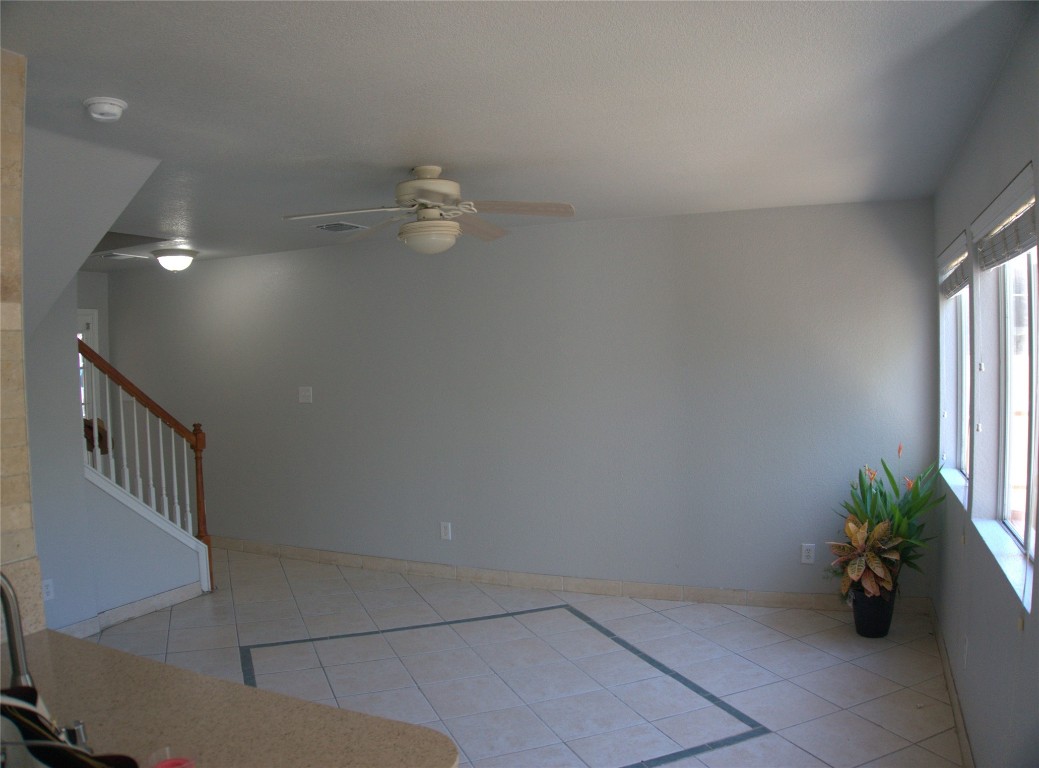 1512 Parkfield Circle Round Rock, TX 78664 - Photo 3 of 26 wooden floor in a hall with a window