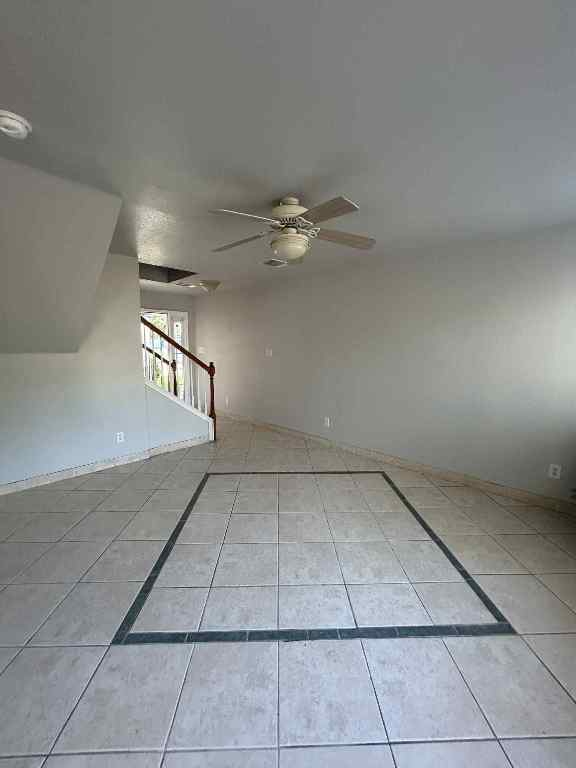 1512 Parkfield Circle Round Rock, TX 78664 - Photo 5 of 26 a view of a livingroom with a ceiling fan and window