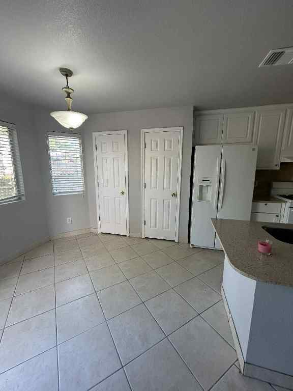 1512 Parkfield Circle Round Rock, TX 78664 - Photo 7 of 26 a view of kitchen with granite countertop cabinets and window
