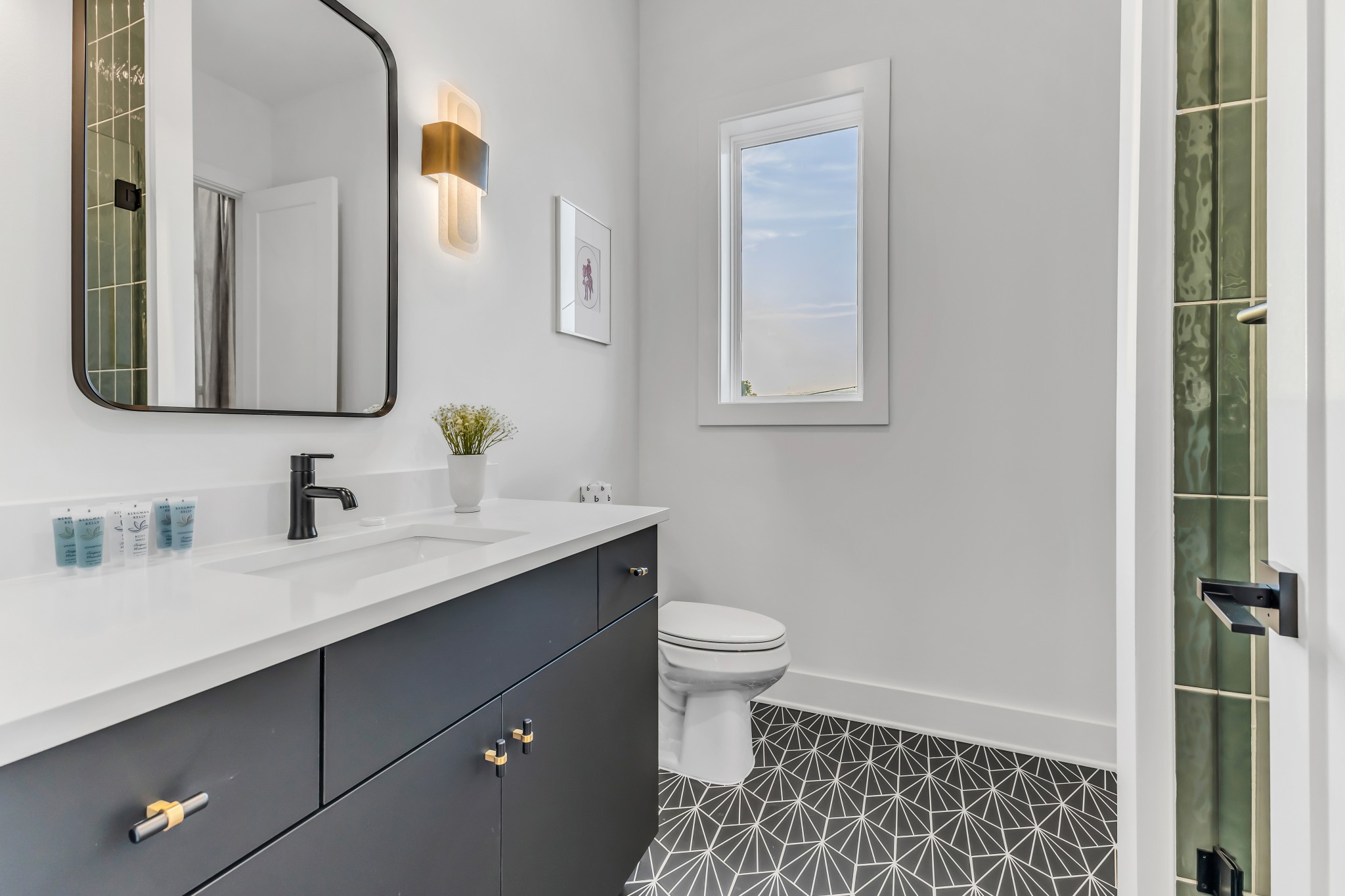 2176 Carson Street, Unit 5 Nashville, TN 37211 - Photo 20 of 40 a bathroom with a sink and a mirror