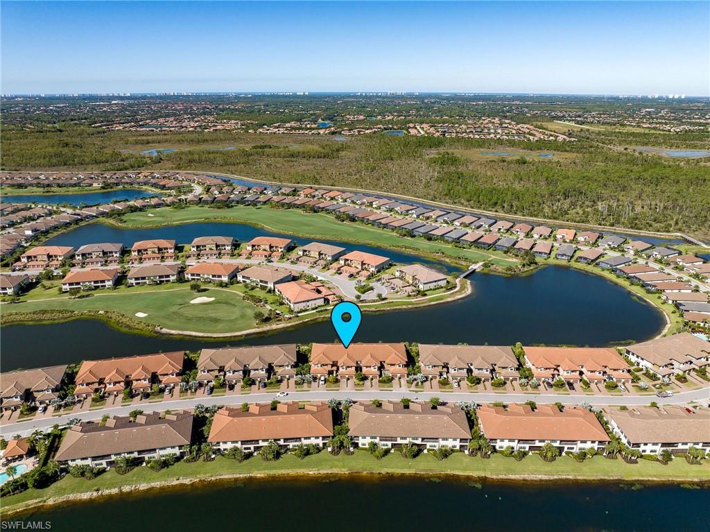 9650 Montelanico Loop, Unit 102 Naples, FL 34119 - Photo 18 of 36 a view of a city with an ocean