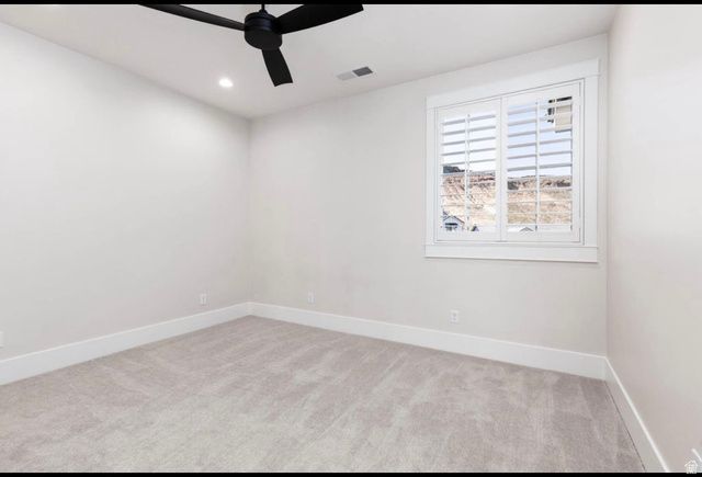 2788 East Rill Drive Washington, UT 84780 - Photo 29 of 41 Neutral-toned carpeting paired with white walls