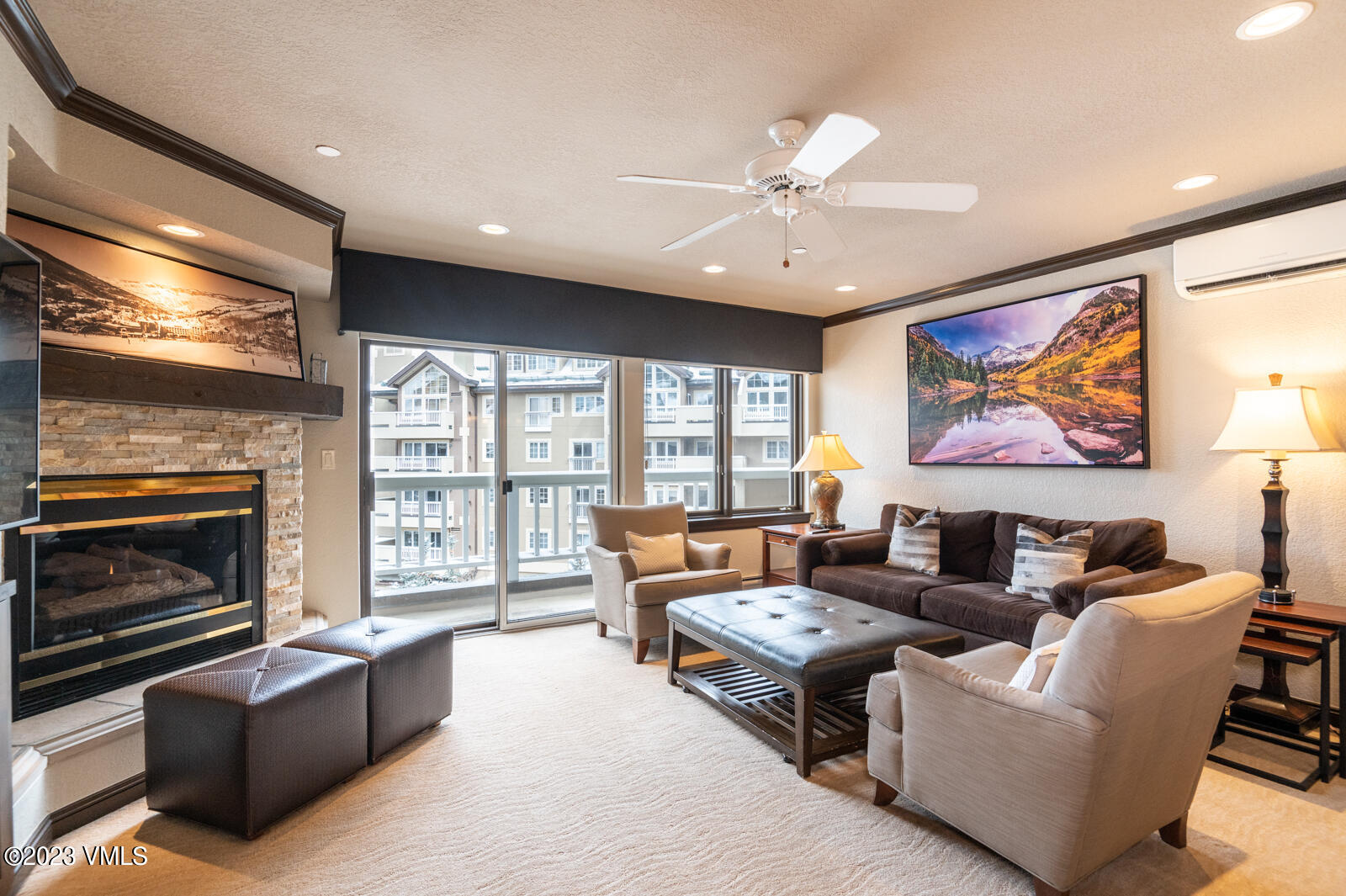 210 Offerson Road, Unit R310/WEEK 51 Beaver Creek, CO 81620 - Photo 2 of 35 a living room with furniture ceiling fan and a flat screen tv