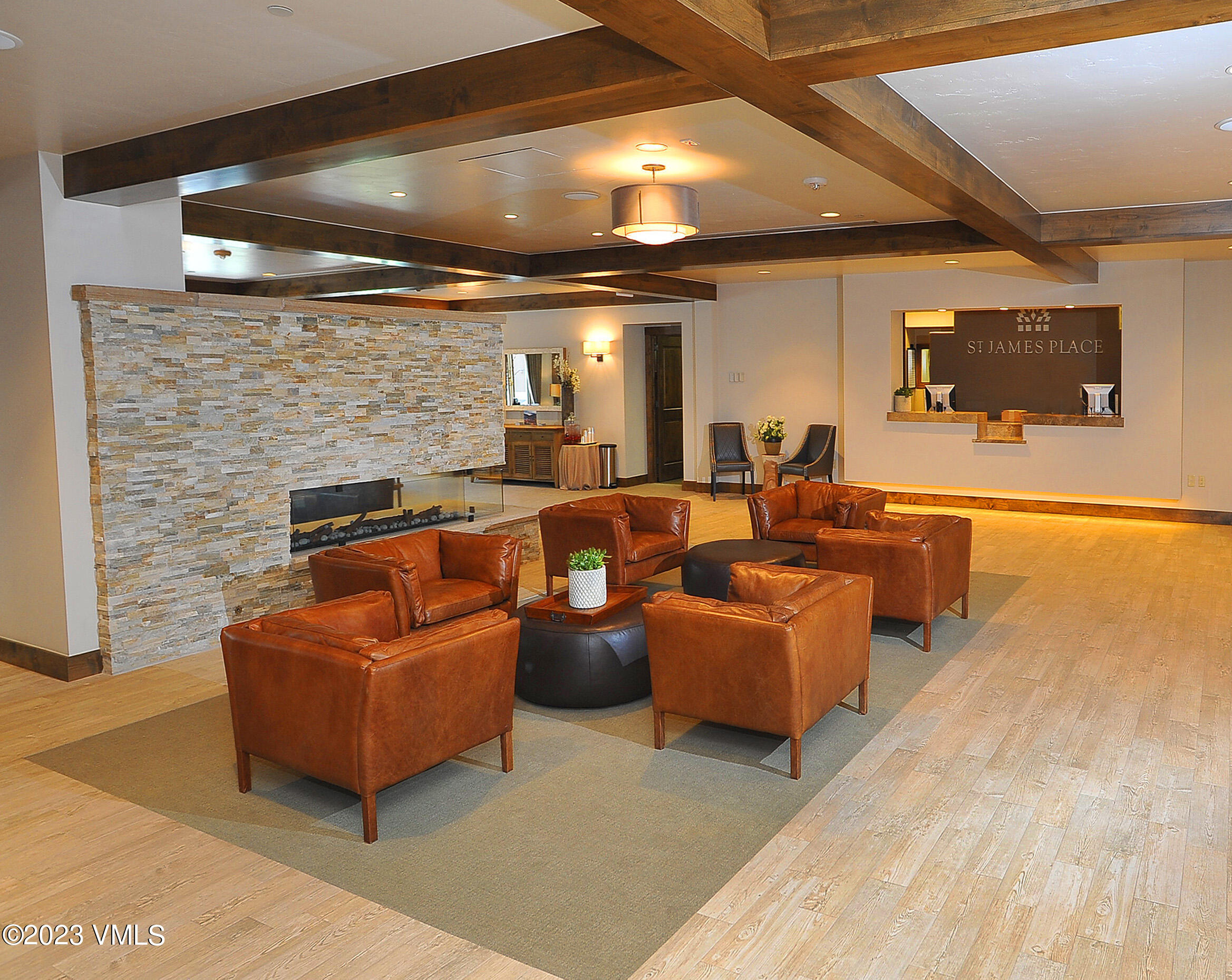 210 Offerson Road, Unit R310/WEEK 51 Beaver Creek, CO 81620 - Photo 29 of 35 a living room with fireplace furniture and a flat screen tv