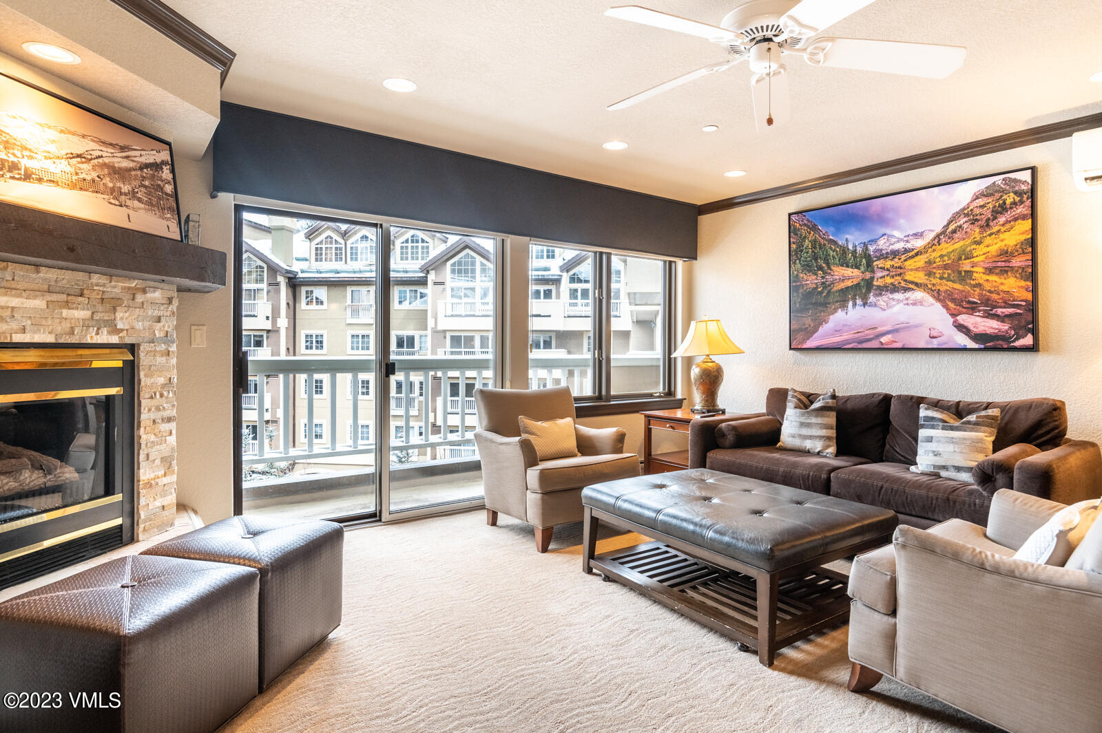 210 Offerson Road, Unit R310/WEEK 51 Beaver Creek, CO 81620 - Photo 4 of 35 a living room with furniture a large window and a flat screen tv
