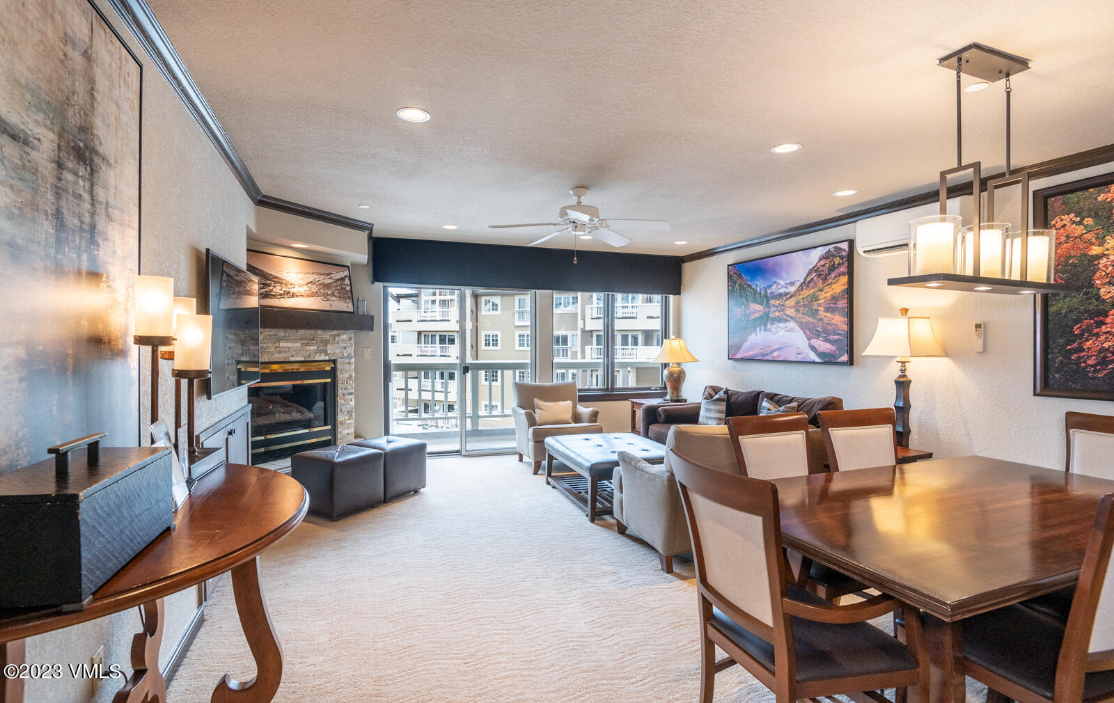 210 Offerson Road, Unit R310/WEEK 51 Beaver Creek, CO 81620 - Photo 7 of 35 a large living room with fireplace furniture and a large window